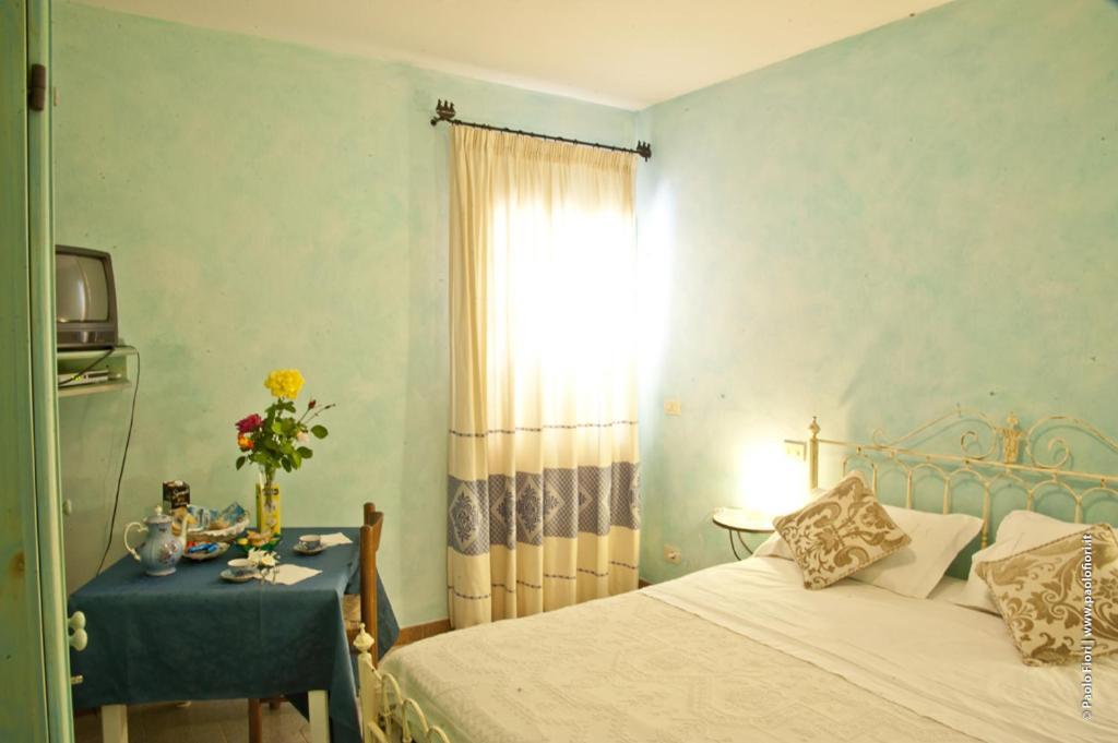 Bed And Breakfast Li Paduli Alvi Cannigione Exteriör bild
